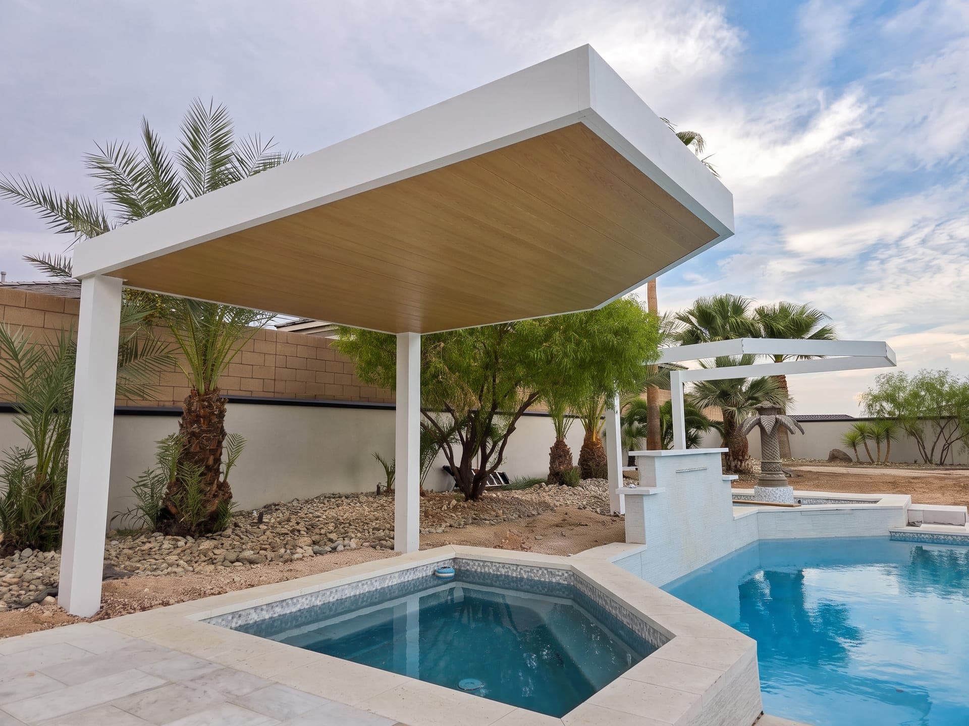 White 4K Aluminum cantilever cover with a solid roof and wood-look ceiling over a backyard spa beside the pool